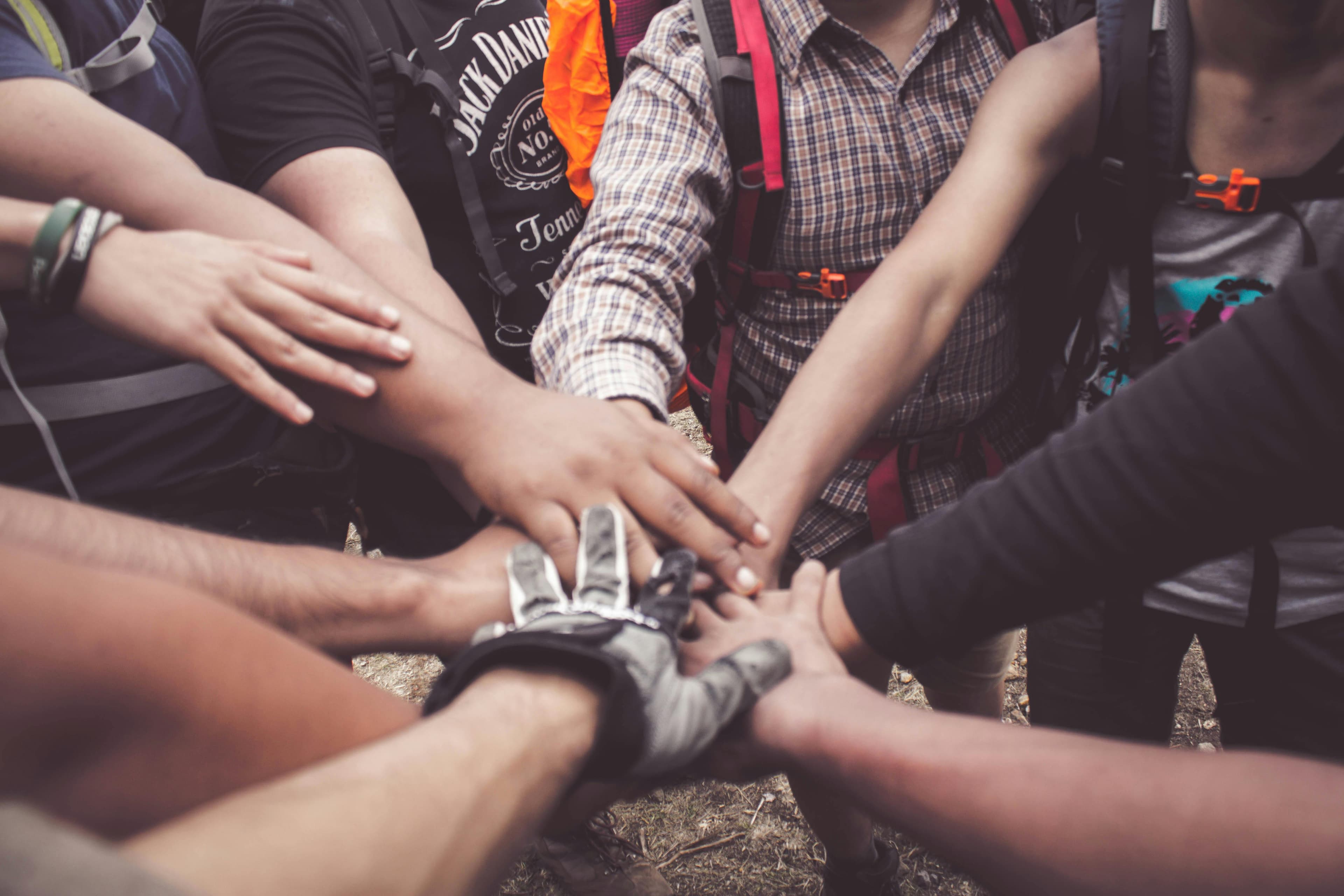 Community hands together